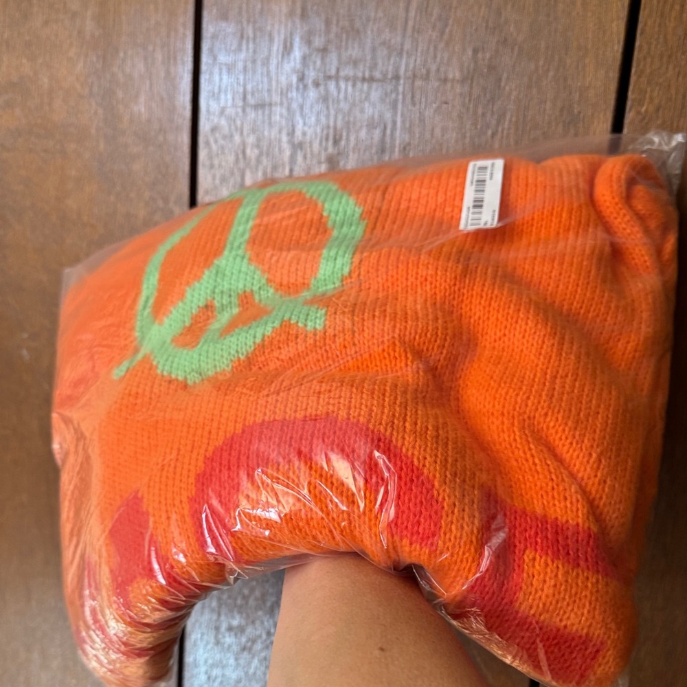 Orange Peace Sign Sweater